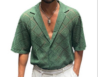 Man wearing a green patterned shirt with a white background